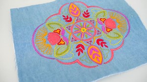 1.8K views · 51 reactions | This is a beautiful design that can be used to embellish jackets, t-shirts or even household decor! https://swpea.com/products/folk-art-mandala-embroidery-design-5x7-6x10-7x12 This design comes in the following hoop sizes: 5x7 6x10 7x12 | Sweet Pea Machine Embroidery | Facebook