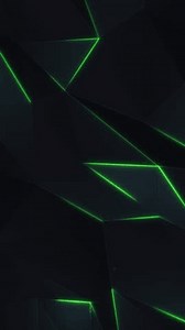 Vertical video - dark futuristic low poly background with the gentle motion of black polygonal triangle shapes and glowing green neon light. HD and looping technology motion background animation.