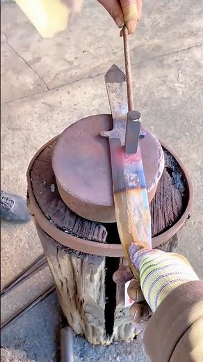 The Blacksmith's Art Expertly Tempering a Custom Forged Knife Blade