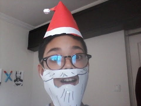How to make an easy paper Santa Claus beard and a Christmas hat.