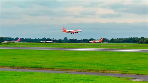 Cameraman distracted as plane lands, caught on camera