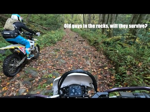 Old guys in treacherous rocky road bed