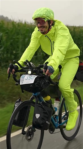 The route bends into the Isar valley and everything turns to river-glass. Emerald water, cool air, meadows leaning into the flow. Wheels whisper on quiet tarmac while Bavaria opens one calm curve at a time. Munich arrives like a held breath released—the first Gate, the first stamp on the Carnet de Passage for those who left Rovereto. Kilometers slip under the tyres; the North is a little closer. You can read it in their faces: free legs, easy smiles, joy riding ahead of them. A passing shower? P