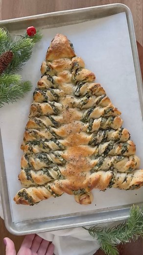 If you haven't made these Christmas Tree Breadsticks stuffed with spinach dip yet, this is the year to try them! This is my most viral post - thousands and thousands of people have made this amazing holiday appetizer and loved it. It looks impressive and tastes incredible, and I'll show you exactly how to make it! Recipe below. | It's Always Autumn