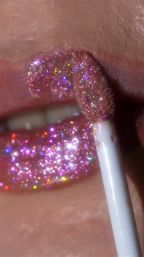 She’s sweet, she’s sparkly, she’s holographic 🌈💖 Rosé Holo gives lips that dewy, star-lit glow - no filter, no stickiness, just magic. Grab yours: https://questionbeauty.com/products/rose-holo #questionbeauty #multichrome #lipgloss #multichromegloss #gloss⁠ #makeup | Question Beauty