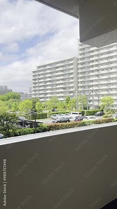 Opening the door to a breathtaking cityscape, the buildings stand tall as you step out of the room. The perfect transition from indoor comfort to urban life.