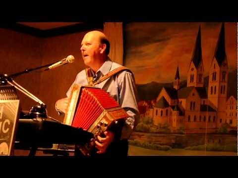 Paul Belanich plays the accordion