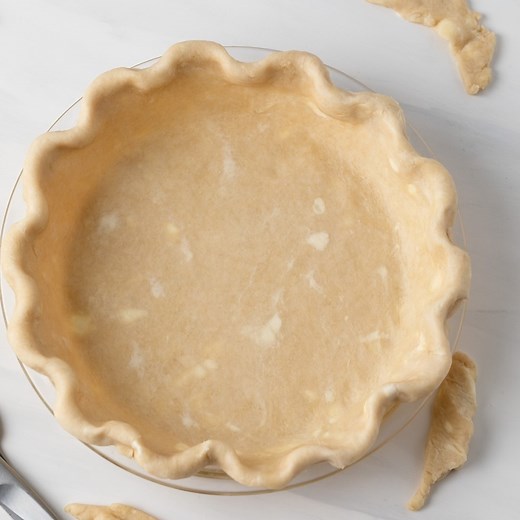 Easy homemade pie crust that is flaky, buttery, and perfect every time. Learn the secret to my no-fail pie dough recipe! Great for beginners! Get the recipe: https://www.bakedbyanintrovert.com/homemade-pie-crust/ | Baked by an Introvert