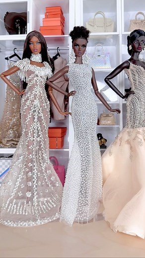 These dolls, adorned in meticulously crafted miniature couture gowns, not only exude style but also celebrate the essence of individuality. Each doll tells a unique story of elegance and diversity, showcasing the stunning gowns individually. A canvas painted with love and crafted with care 🖤✨ #couture #dollcollection | plastic_chic
