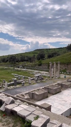 The ancient city of Pergamon (present-day Bergama, Izmir, Türkiye) was the capital of a kingdom founded during the Hellenistic period in the 3rd century BC. Ruled by the Attalid dynasty, the city became a cultural and scientific center, particularly during the reign of Eumenes II (197-159 BC); its world-famous library, with 200,000 scrolls, was second only to Alexandria's; parchment paper was invented here. It is renowned for its magnificent acropolis, the Altar of Zeus, its theater, and the Ask