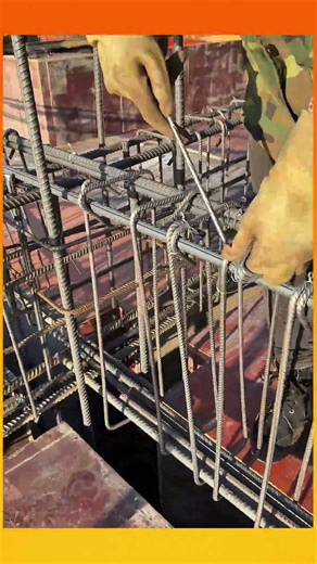 Tying rebar rods securely with wire wraps for a firm concrete structure. #construction #metalwork