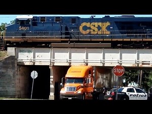 Truck Drives Under Bridge + Gets Stuck