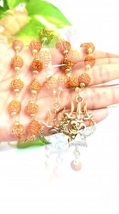 1.6M reactions · 11K shares | ️ ॐ नमः शिवाय | "Radiate divine elegance with our Gold-Plated Rudraksha Trishool Necklace. This exquisite piece seamlessly blends spirituality and style, making it a perfect companion for any occasion.  ✨ Elevate your look and connect with ancient Hindu traditions today!  Shop Now: https://www.divinehindu.in/ Limited Stocks | COD Available | 100% Authentic Rudraksha | ॐ नमः शिवाय | Divine Hindu | Facebook