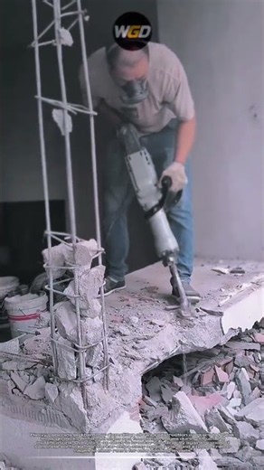 Concrete slab breaking process: Pneumatic chisel jackhammer practice for structural demolition