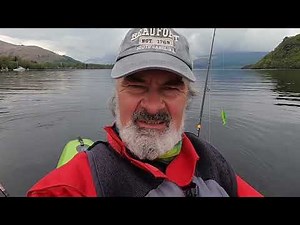 Our big play ground . Kayak fishing on Loch Lomond , Scotland .