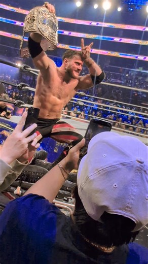 MJF posing on top of Hangman Adam Page on the stretcher at AEW Revolution 2026