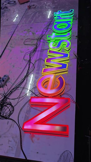 Playful Vibrant Illuminated Sign - Perfect for Trendy Shops in Europe #sign #signage #design