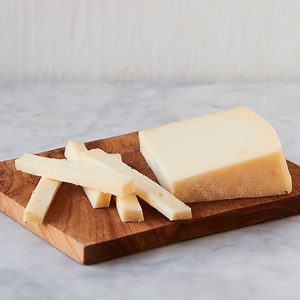 Asiago Pressato - a mild, sweet, buttery Italian cow’s milk cheese  | Murray's Cheese
