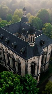 A forgotten architectural giant resting quietly in the forest, its history fading but still hauntingly beautiful. #abandonedplaces #urbex #lostarchitecture #forgottenworld #decayandbeauty #hauntingviews #urbexexplorer #desertedbuildings #mysticruins | Mysterious Places