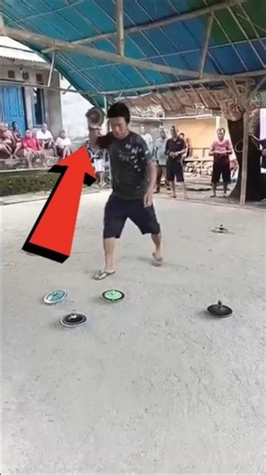 Indonesia's Deadly Spinning Top Battle 😱🌀 #Shorts #Indonesia #TraditionalGames