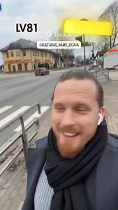 🇱🇻🚙 I arrived in Iecava now and I feel happy like a little child, because this is the road I usually take when I drive from Riga to Germany 🇩🇪 or back — and it always gives me that positive excitement. Yes, there are usually heavy trucks passing by 🚛🚚🚛. I don’t see any right now, but normally there are. I dared to step out, and I’m truly happy that I can even perform here 🎤🎶, right next door. Everything is perfectly fine here at the cultural center — even a Christmas tree. And I’m just