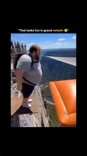 sci || teach || physics || on Instagram: "The reel captures a daring mid-air stunt over a massive valley net: a performer sprints toward the edge and leaps outward, landing perfectly into the suspended mesh as the net ripples and rebounds beneath them. The wide-angle shot makes the drop look endless, adding to the illusion of free-fall while the safety rig keeps the stunt controlled. Shared in early 2026, the clip quickly surged past thousands of views and comments, with many viewers debating wh