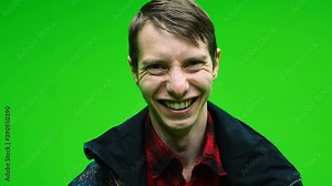 Happy man laughing out loud lol cracking up and being hysterical at something funny