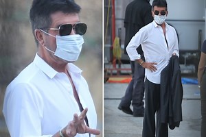 Simon Cowell takes no risks as he returns to work in California wearing a face mask and shades