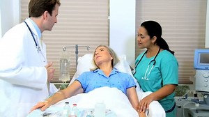 Hospital Doctor Nurse Giving Medical Care Stock Footage Video (100% Royalty-free) 4312880 | Shutterstock