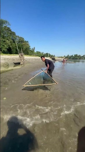 The push net is the perfect companion for navigating the river shallows.