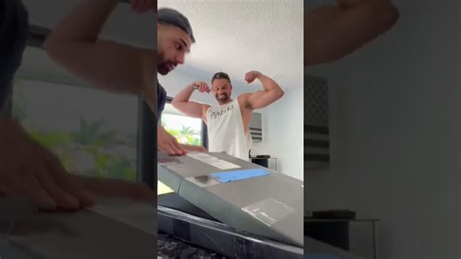 I gave my cameraman his own gold play button! #contentcreator #goldendoodle #youtube