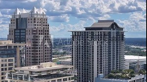 Downtown Orlando FL June 24 2024 Lake Eola Sunny Cloudy SunTrust Bank