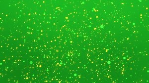 Animated green sparkling background with colorful glitter light particles.