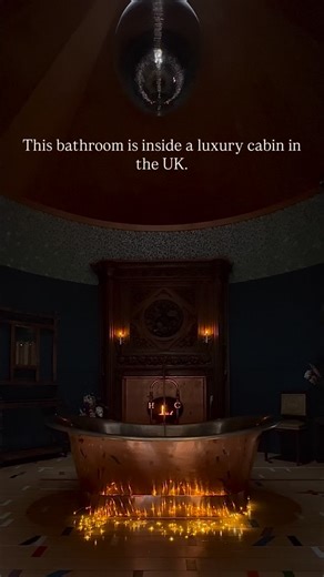 Unique woodland cabins and canvas lodges on Instagram: "This bathroom is inside a luxury cabin in the UK… At Rocket Lodge, huge chapel doors open into a grain silo bathroom with a deep copper bath, a hand-carved oak fireplace, and a mirror ball that fills the room with light. It’s the kind of space guests don’t expect to find in a cabin stay. Rocket Lodge is a favourite for couples looking for a unique weekend stay or midweek escape surrounded by nature and thoughtful design. If you’re searching