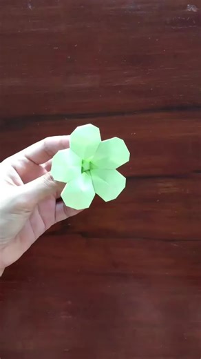 Turning a simple square of paper into a blooming 5-petal flower. #origami #papercraft #diyflower #paperfolding #origamiart