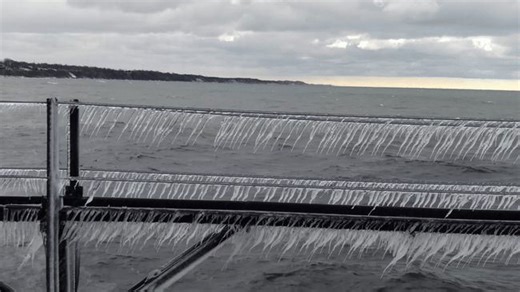 Icicles Cling to Lake Michigan Pier as Winter Weather Hits