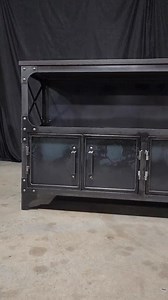 Welcome to the 60-in of our Java Cabinet, the ultimate coffee bar station for starting your day off right. This beautifully crafted piece combines Modern Industrial style with functionality, featuring a solid wood top made from American oak and an open area below to display all your coffee bar essentials. The Java also has solid doors on the bottom, providing ample storage space for all your coffee-making supplies. Whether you're a coffee connoisseur or just enjoy a cup to kick off your day, the