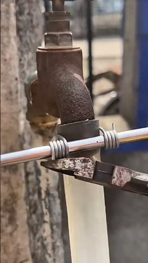 Tying the water hose using wire and screws #wire #diyprojects #diy