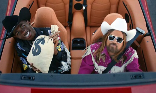 Time Traveling Cowboys and Yee Yee Juice: Watch Lil Nas X, Billy Ray Cyrus' 'Old Town Road' Video