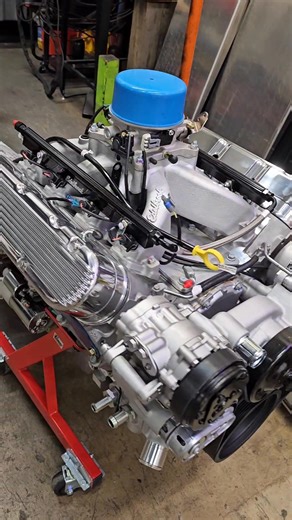 Tony dressing our customer's new GM Performance LS3 in a Holley accessory drive kit and an Edelbrock Performance Pro-Flo 4 EFI. #lsengine #lsswap #lsconversion #metalworksspeedshop #metalworks | Metalworks Classics & Speed Shop