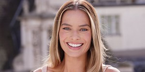 Margot Robbie Re-Enters Her ‘Barbie’ Era in a Light Pink Cone Bra and Matching Miniskirt