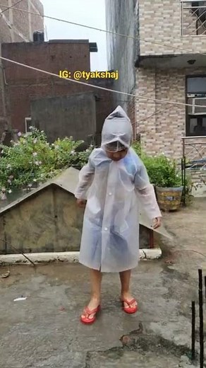 Jumping with Raincoat in Rain 🌧️⛈️🌦️ What Fun!! ☔ #rain #rainyday #raining