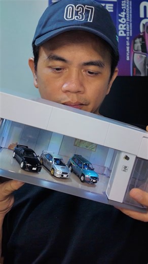 Hot Kustoms on Instagram: "The perfect garage for any 1/64 model cars. Tomica Premium Garage Series 2 brings a serious upgrade for display and photography. Every car instantly looks more premium in this setup. Follow @hotkustoms for more diecast heat #TomicaPremium #DiecastDisplay #164scale #ミニカー #ジオラマ"
