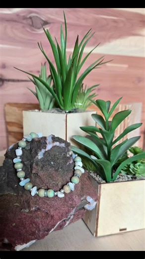 This elegant 8½ inch long bracelet features beautiful seashells and green wood beads, perfect for adding a touch of nature-inspired style to any outfit. $15.00 S&H #countrygypsyor