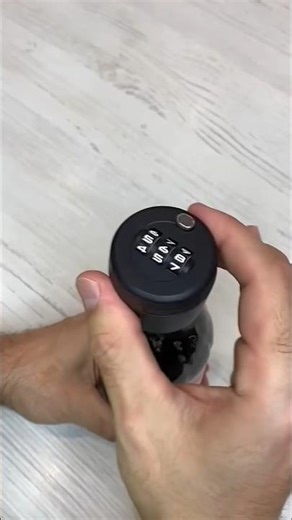 He tried all the ways to remove the combination lock from the Coke bottle