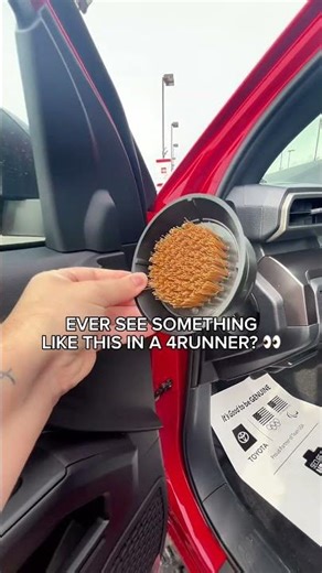 Only in a Toyota 4Runner will you find a boot brush & ice scraper...