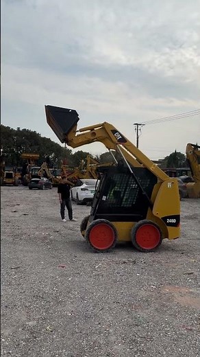 Cat 246D skid steer loader with powerful performance.