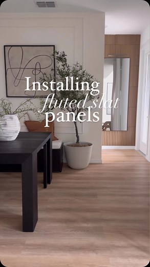 An affordable alternative to wood slats for an easy DIY home project! These panels also come in a lighter shade and black 😍 | Glamorouslyliving