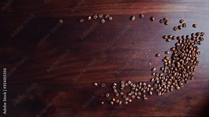 Bag of coffee beans tipping over and falling on table, beans spilling out Stock Video