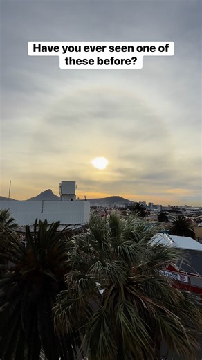 Sun dogs can sometimes show a rainbow-like spectrum of colors, with red closer to the sun, and are often seen when the sun is low on the horizon #sundog #capetown #southafrica #rainbow | Life of Mike